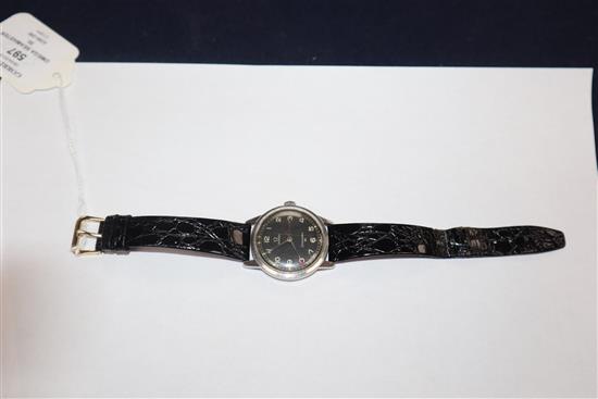 A gentlemans early 1960s stainless steel Omega Seamaster 30 manual wind wrist watch with military type black dial.